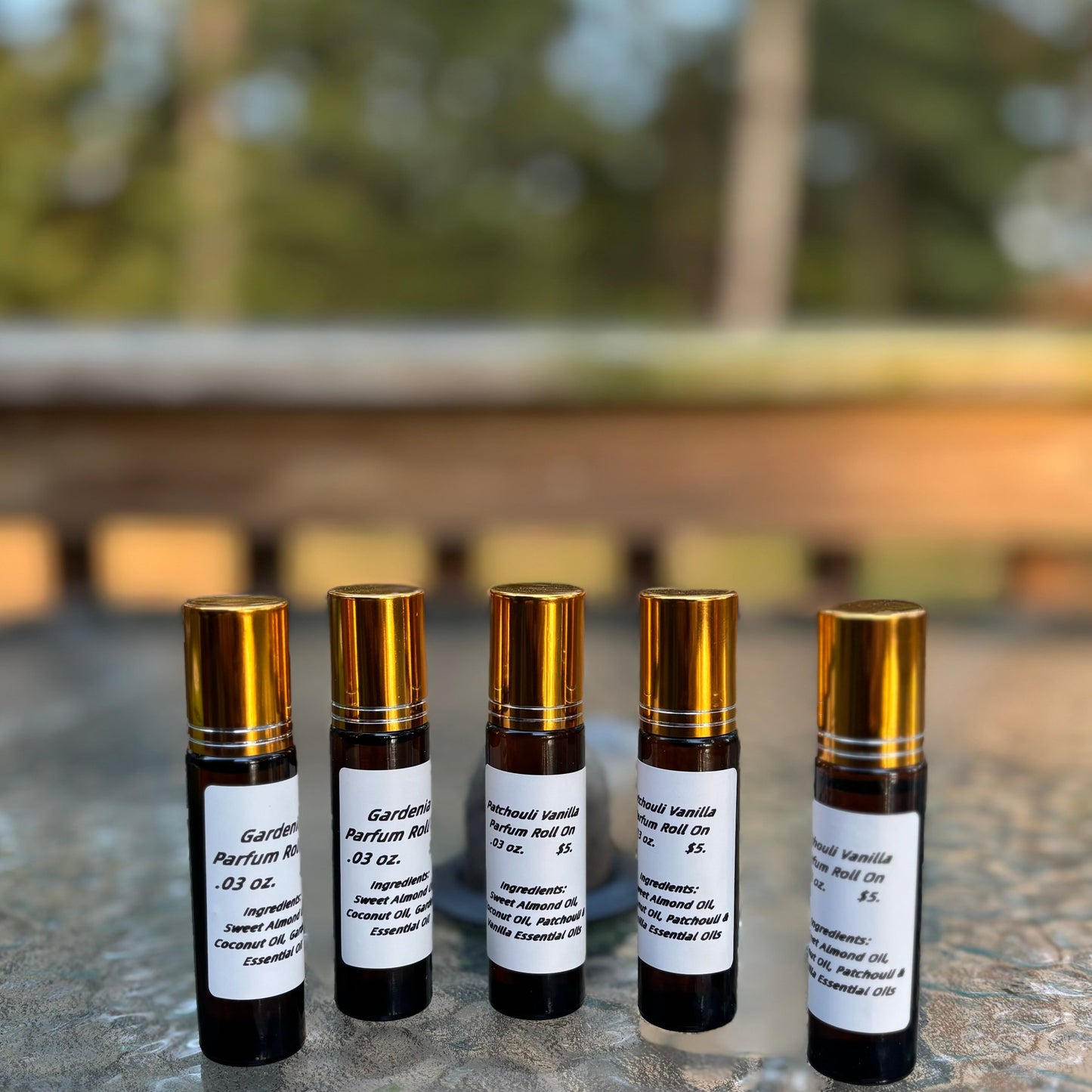 .03 oz Essential Oil Roll on Parfum in Gardinia, Patchouli, Lily of the valley, Twilight Amber, Patchouli, Lavender, lavender vanilla