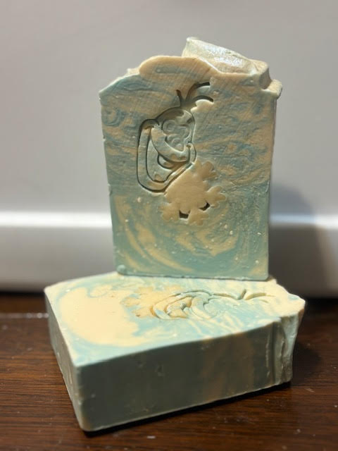 Snowman & Snowflake goat milk soap white & blue with a swirl pattern lemongrass sage scent