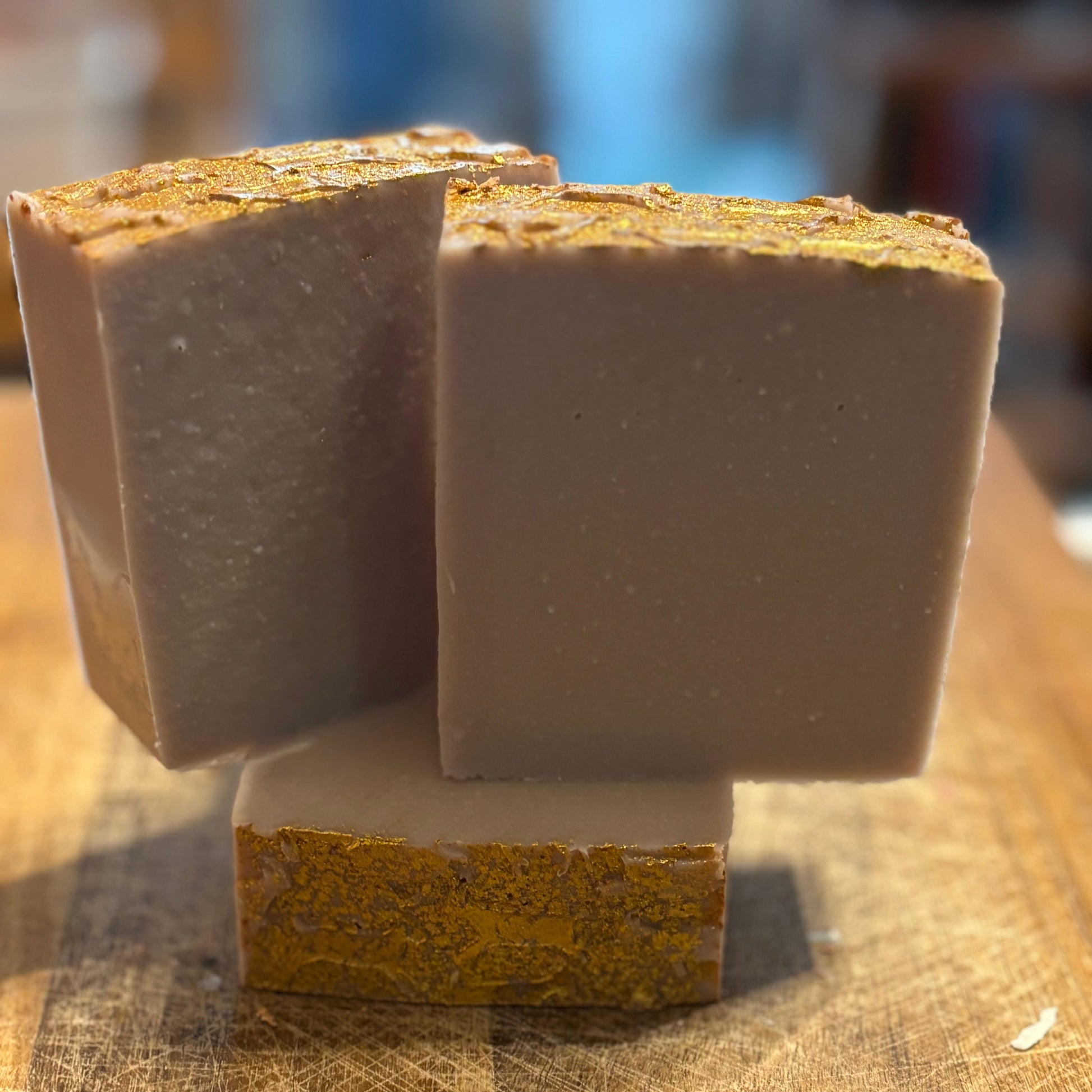 lavender scented -5 oz  goat milk soap with dancing goats on top accented with glitter