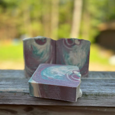 blue cotton candy scented -5 oz  goat milk soap with red white a blue swirl
