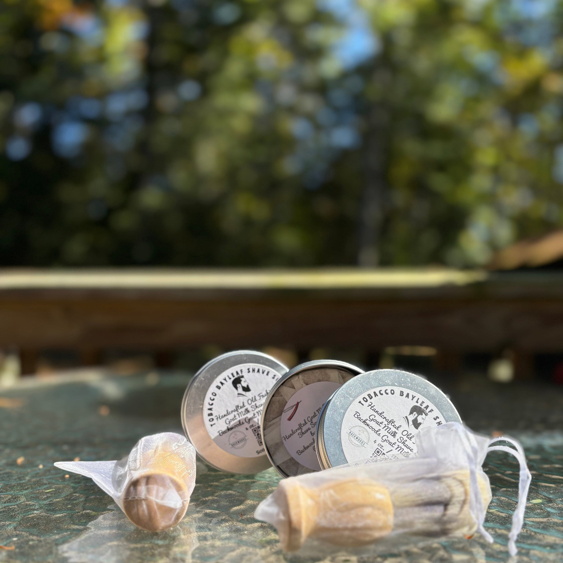 Men's Shave Soap Set, a tin with men's shave soap and a shave brush in a sheer organza bag.  a variety of scents available . some are tobacco Bayleaf, Kentucky Bourbon, the Perfect man